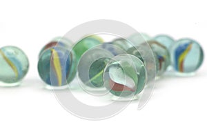 recreative small glass balls on white background photo