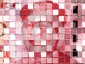 Closeup of recurring Chinese currency imagery on white tiles