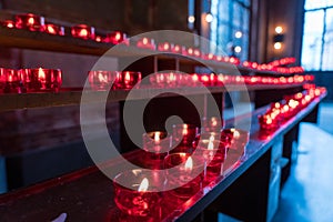 Red candles in Frankfurt dom church, germany