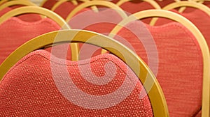 Closeup of red Chair in the conference hall