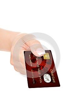 Closeup of red credit card holded by hand over white