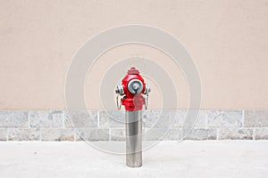 A closeup of a red fire hydrant outdoor