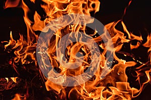 closeup of red flames in a fire bowl