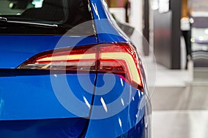 Closeup of a red led taillight on a modern car, detail on the rear light of a car