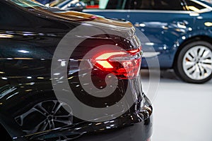 Closeup of a red led taillight on a modern car, detail on the rear light of a car