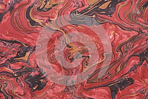 Closeup of red marbleized paper
