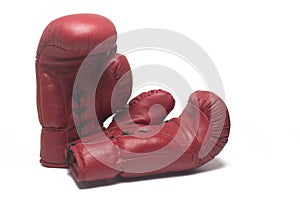 Closeup red retro boxing gloves white background