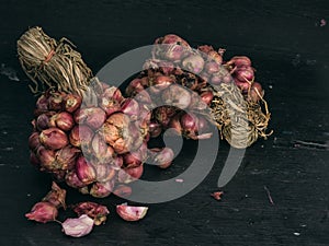 Closeup red shallot on dark background