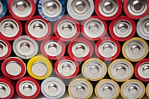 red and silver aa alkaline batteries stack on full frame
