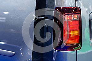 Closeup of a red taillight on a modern car, detail on the rear light of a car