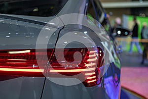 closeup of a red taillight on a modern car, detail on the rear light of a car