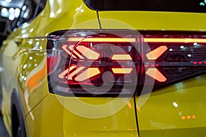 closeup of a red taillight on a modern car, detail on the rear light of a car