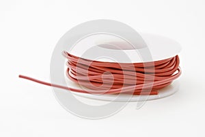 Closeup of red wire spool