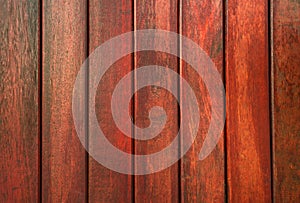 Closeup red wood with unique pattern texture background with copy space for text. Wood background for construction site.