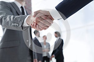 Closeup.reliable handshake of business partners