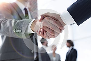 Closeup.reliable handshake of business partners