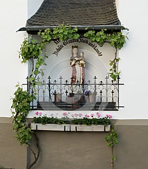 Closeup of a religious shrine outside the Carmelite Church in Boppard, Germany