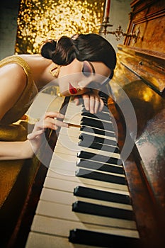 Closeup retro portrait woman musician plays piano melody touches keys her hand
