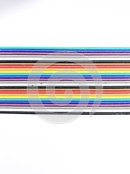 closeup ribbon cable or coded flat cable isolated on white background
