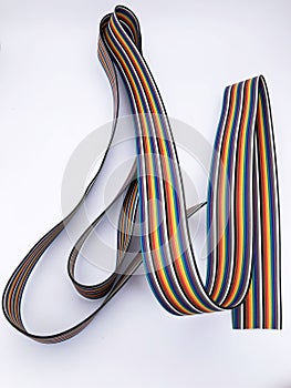closeup ribbon cable or coded flat cable isolated on white background
