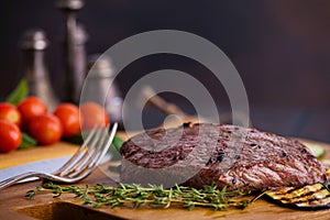 Closeup ribeye beef steak with vegetables