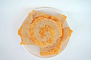 Closeup of Rice CracKer with Flossy Pork photo