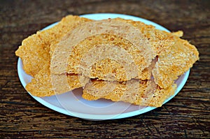 Closeup of Rice CracKer with Flossy Pork photo
