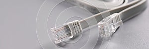 Closeup of rj45 cable on gray background