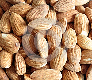 closeup of roasted almonds background