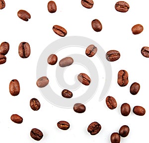 Closeup of roasted coffee beans isolated on a white background