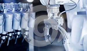 Closeup robot for working in industrial food factory, Automated production line