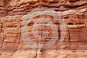 closeup of rock formation details on a desert cliff face