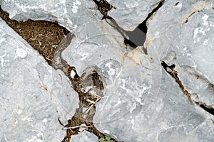 Closeup rock pattern with hole in nature
