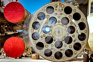 Closeup of rocket launchers of a military helicopter photo