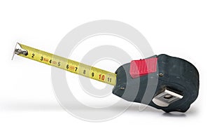 Closeup rolling tape measure meter white background