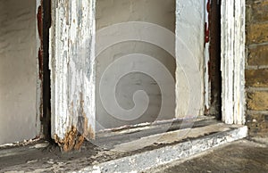 Closeup of rotten sash window frame