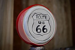 Closeup of a round "Route 66" sign