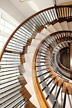 Closeup of a round staircase over three floor's