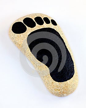 Foot print painted on pebble.