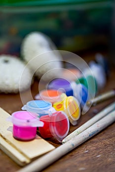 Closeup of a row of colorful watercolor paints