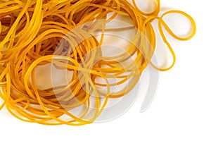 Closeup of rubber bands on a white table under the lights