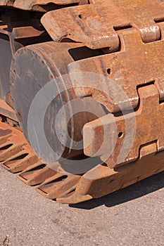 Closeup of rusty caterpillar tracks