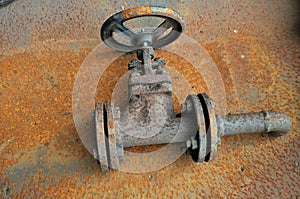 Closeup of rusty valve in pipeline