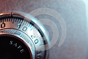 closeup of a safe and the combination dialer.