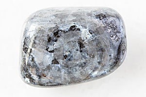 Polished Larvikite Labradorite rock on white