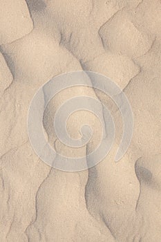 Closeup of sand pattern of a beach