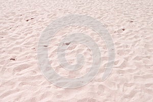 Closeup of sand pattern of a beach in the summer