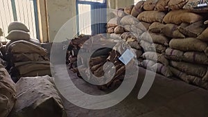 Closeup of sandalwood stored inside the mysore sandal soap factory