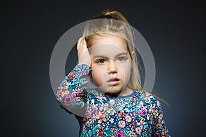 Closeup Scared and shocked little girl. Human emotion face expression