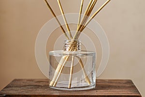 Closeup of scented candles on a wooden stand